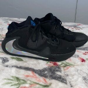 Black Nike Basketball Shoes With Holographic Nike Check and Roses on the bottom